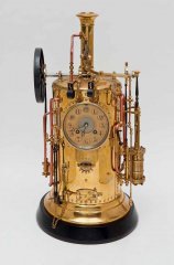 Часы «Паровая машина» Франция. Начало XX века Фирма часовых механизмов  «Japy Frères & Cie» («Братья Жапи и Ко»)